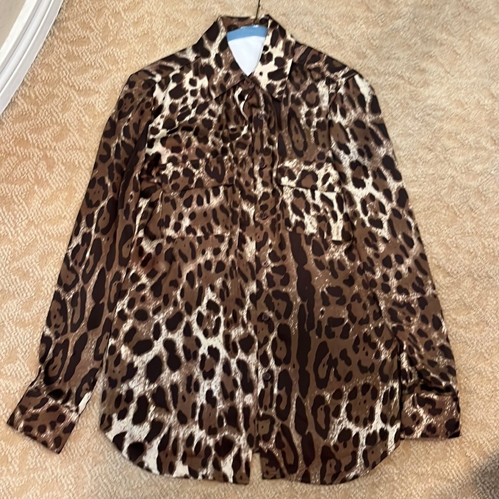 Woman’s brown and tan decorative blouse
